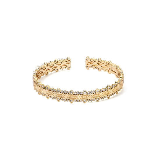 18K gold-plated bracelet features layered filigree craftsmanship